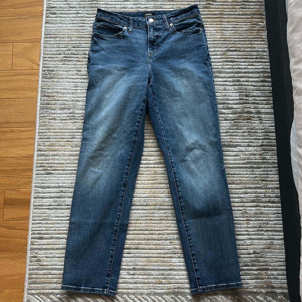 Medium wash denim jeans. Express, size 8/large.